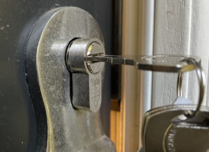 Locksmith unlocking a house in West London